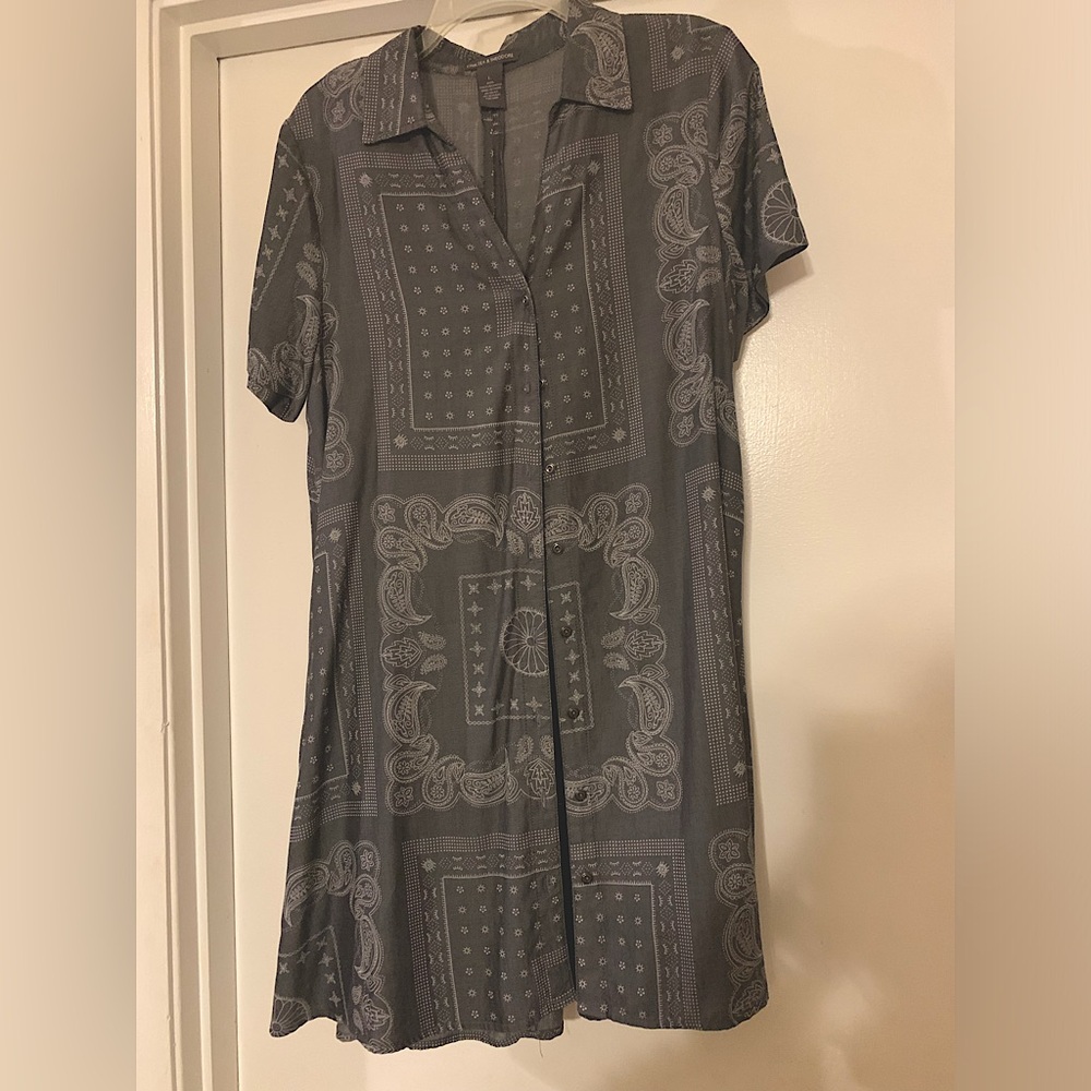 Multi print short sleeve button down short dress.